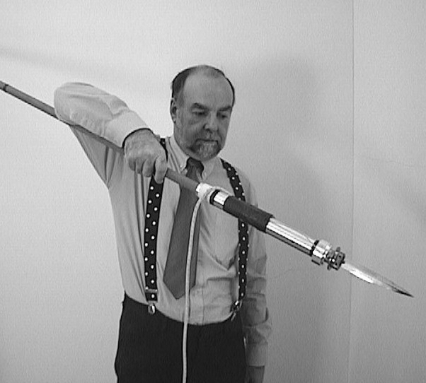 Shoulder-level grip.
