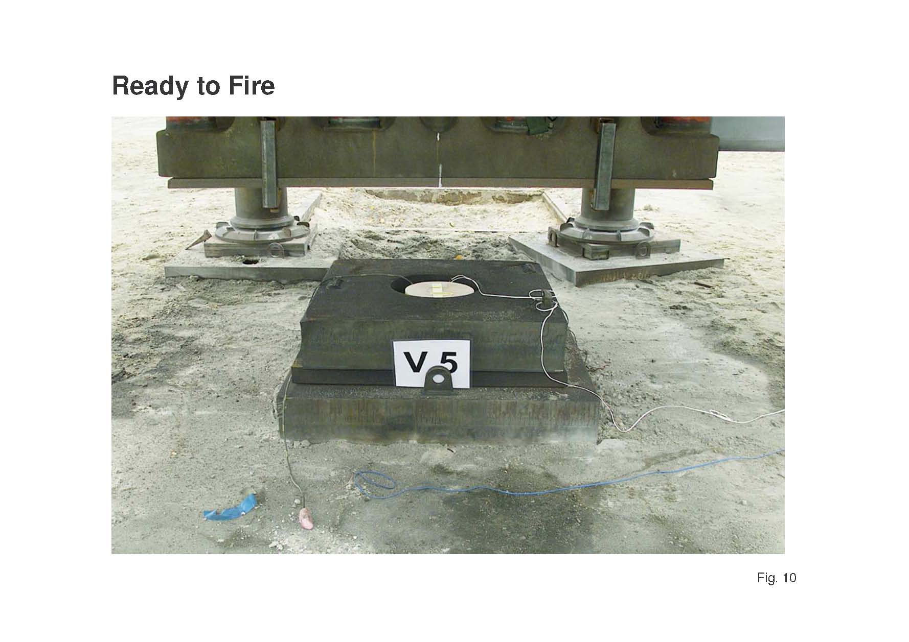 8-kg TNT-charge with L/D 1/3 in a steel pit, arranged 500 mm beneath the test plate.