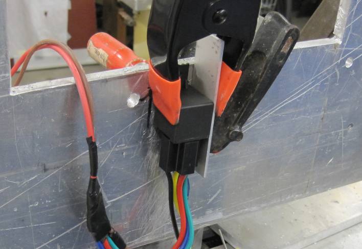 Close up photo of the relay in the experimental setup.