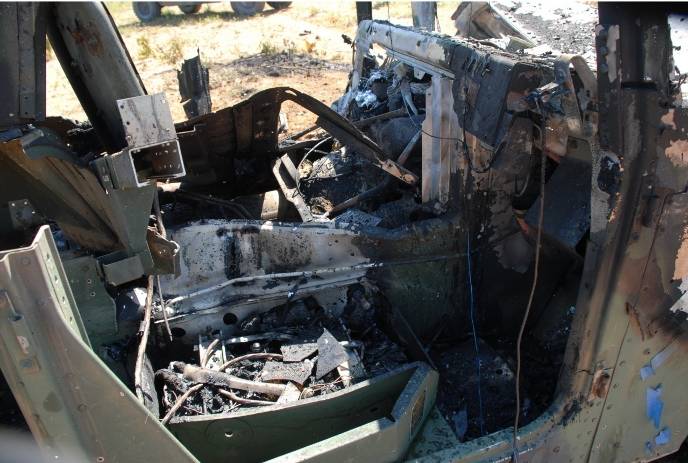 Driver and passenger seats completely destroyed.