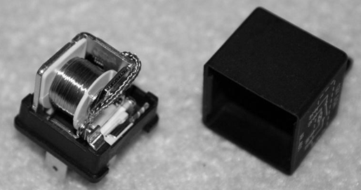 The relay with the plastic cover removed. View from the front/right direction.